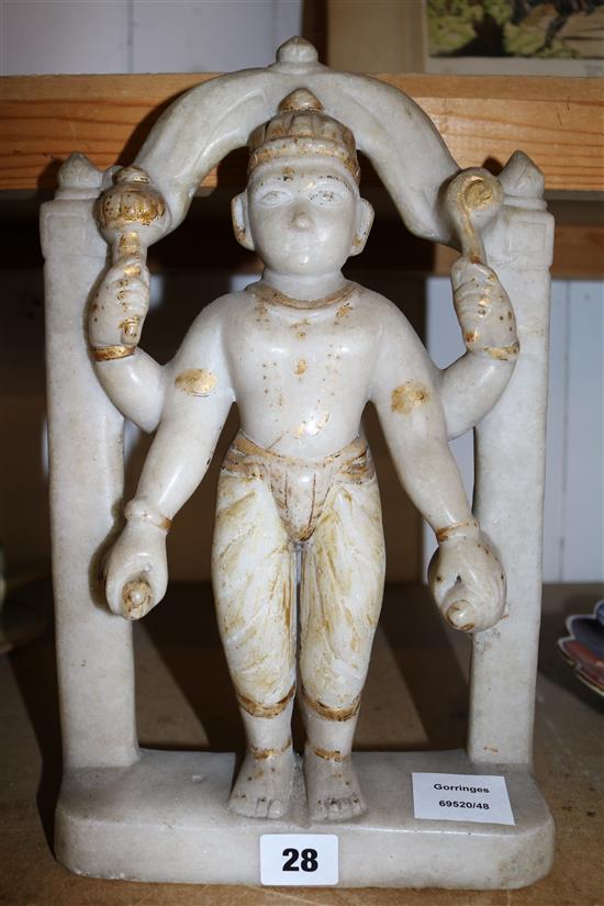 An Indian carved alabaster figure